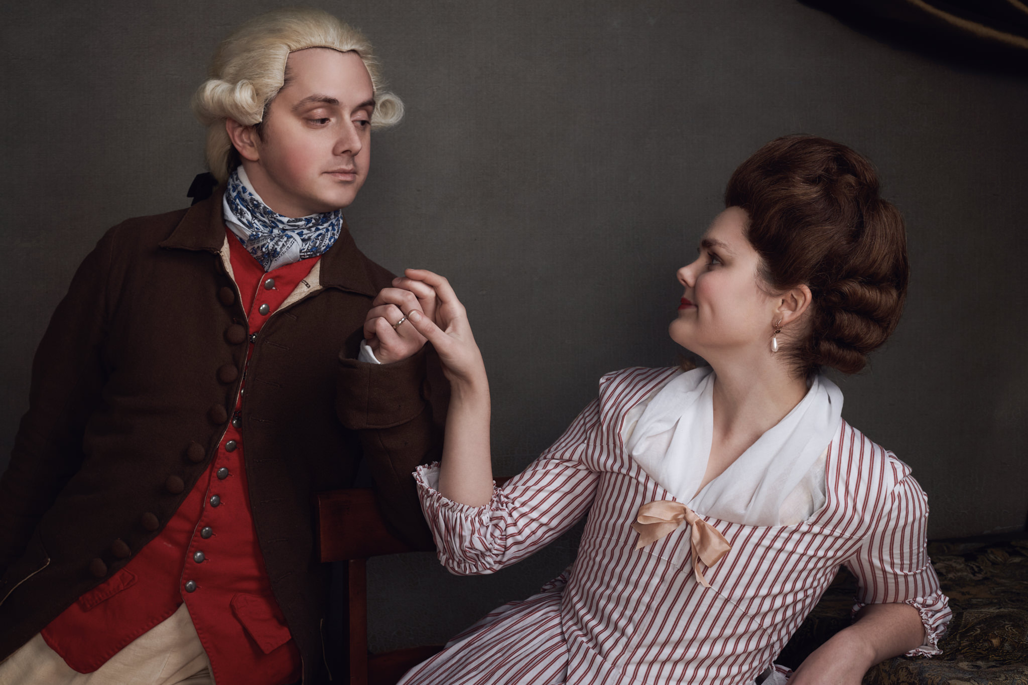 The Esquire with his lady, who is wearing one of our "discreet" custom historical wigs, dressed in an 18th century style.