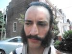 Custom mustache and large sideburns
