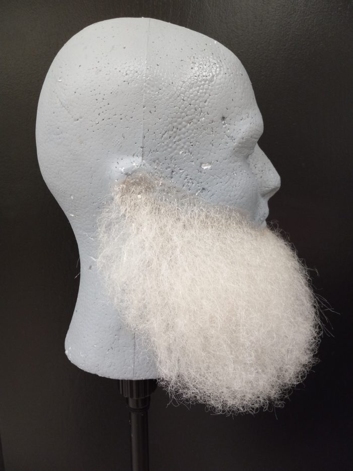 curly Santa beard in profile